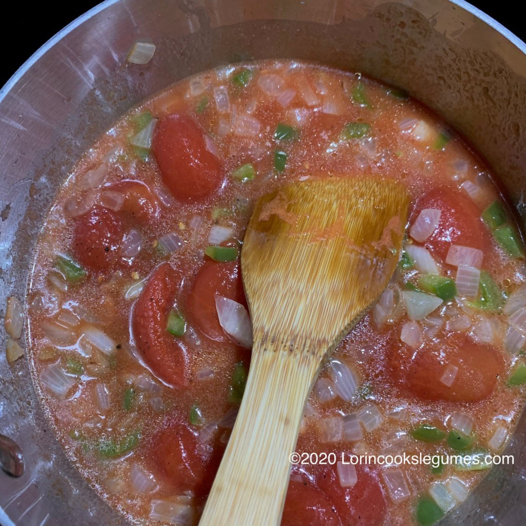 Add tomatoes, sugar and seasonings. Simmer for 15 minutes.